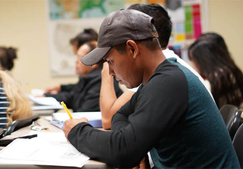 A students taking notes.