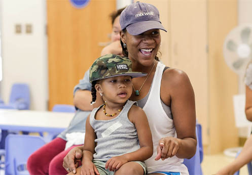 A mother and son in a parenting class