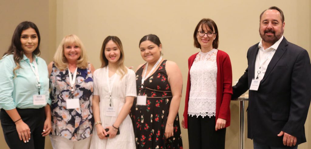 A photo of the 2018 Scholarship winners with the donators and President Valentia Purtell. 