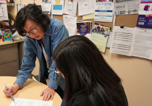 a counselor in a session with a student